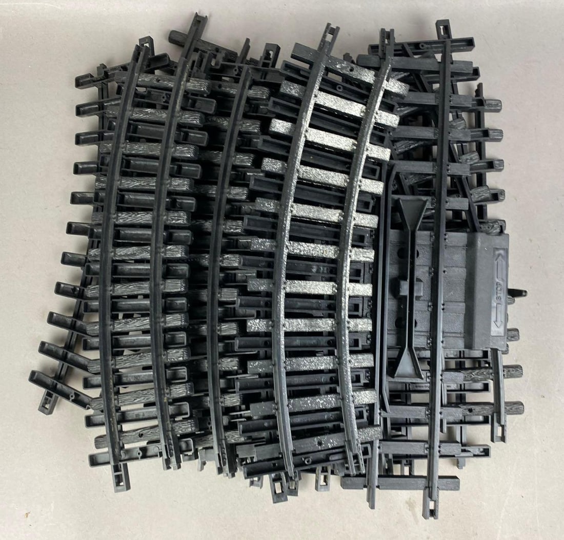 Group of 10+ 1986 New Bright Plastic G Scale Train Tracks: Includes Straight, curved, and more. Largest measures 10 inches in length.