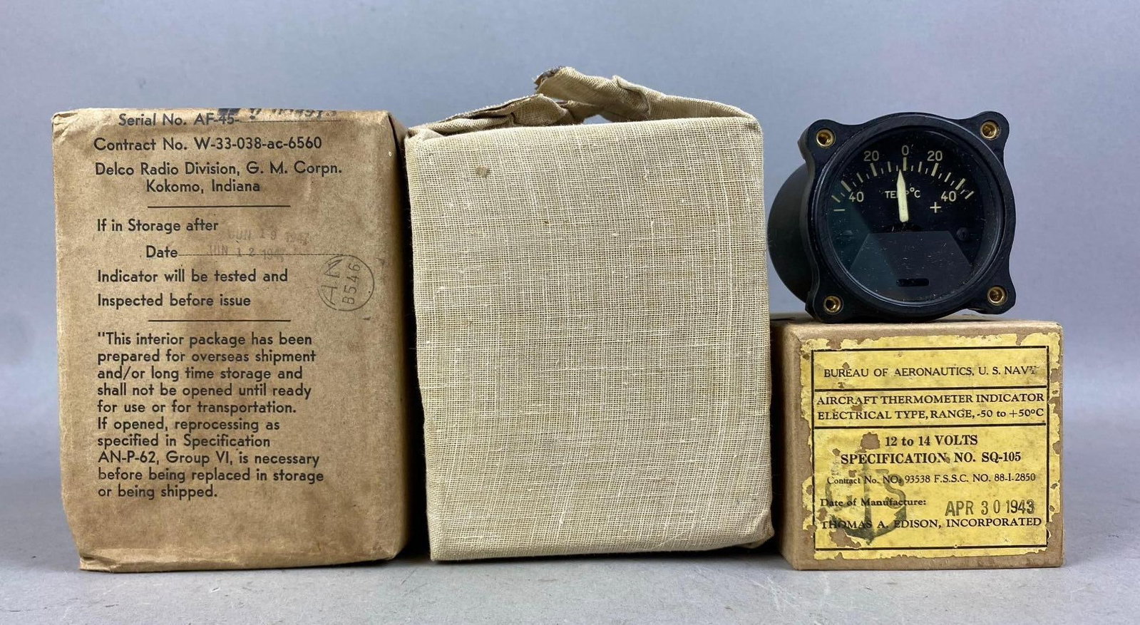 Group of 3 WW2 U.S. Navy Aircraft Parts: Includes Aircraft Thermometer, Oxygen Flow indicator, and more. New Old Stock. Largest measures H 5 x W 4 x L 4 inches