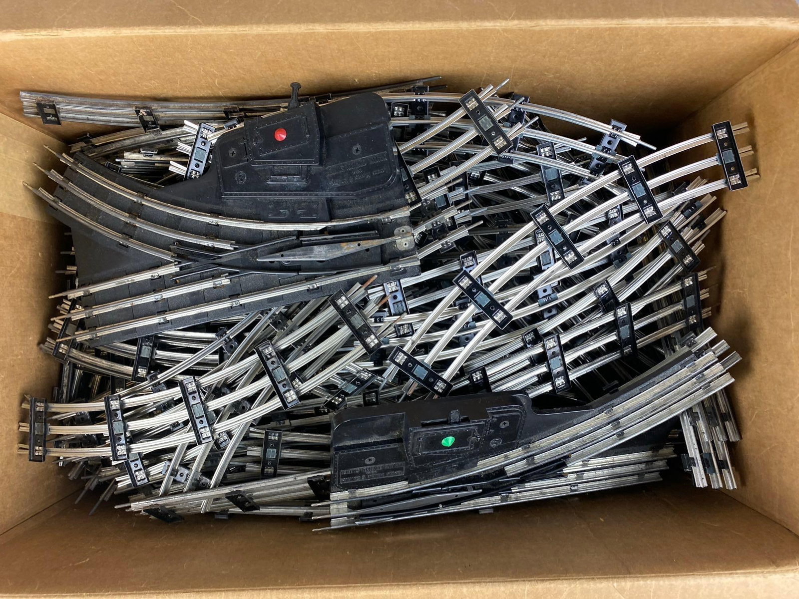 Group of 30+ 1950s Marx O Scale Train Tracks: Includes Curved, straight, and more. Largest measures 9 inches long.