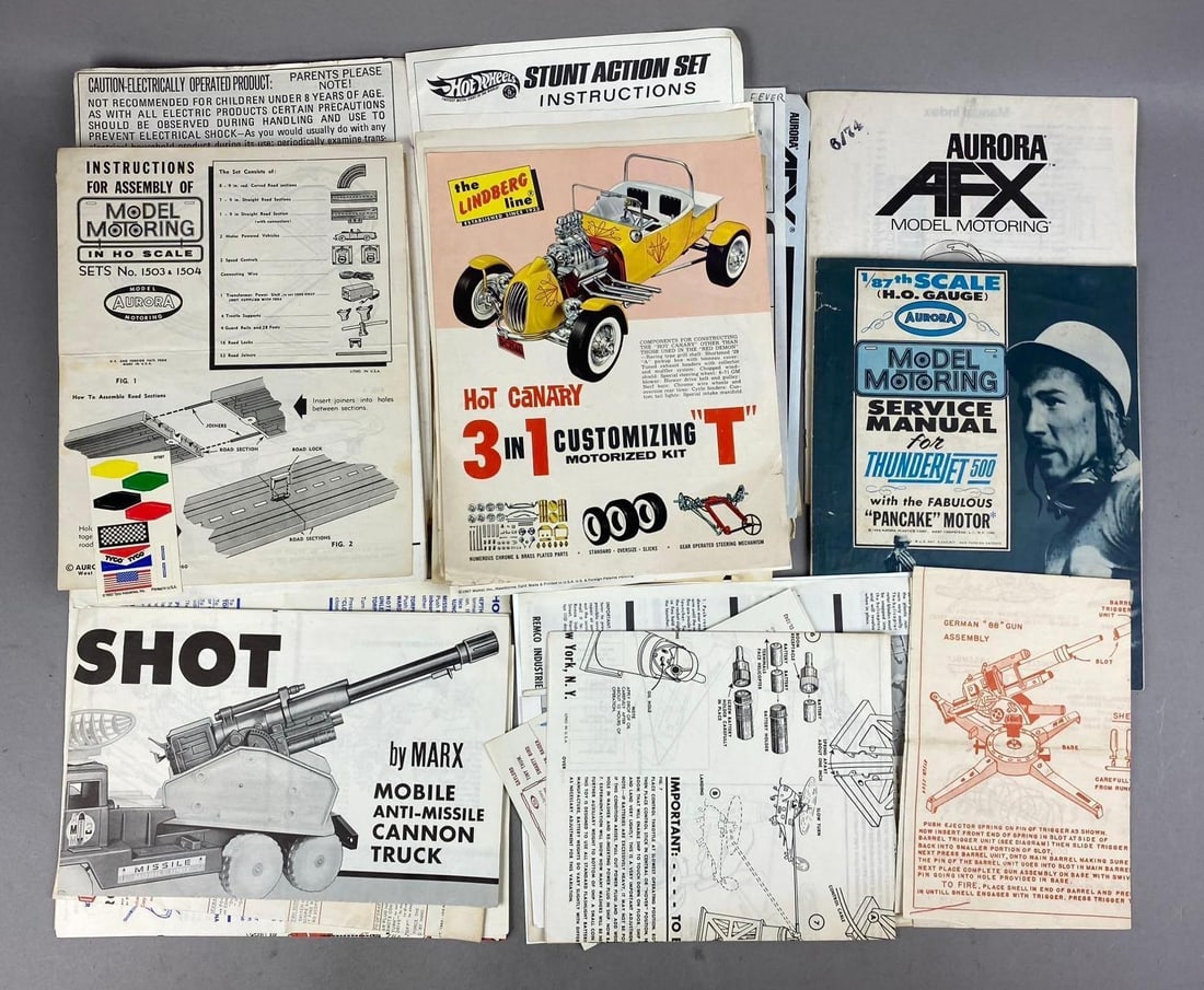 Group of Assorted 1960s Aurora Plastic Co. Instructions and More: Includes Marx cannon truck, Lindberg instructions, and more. Largest measures L 10 x W 8 inches.