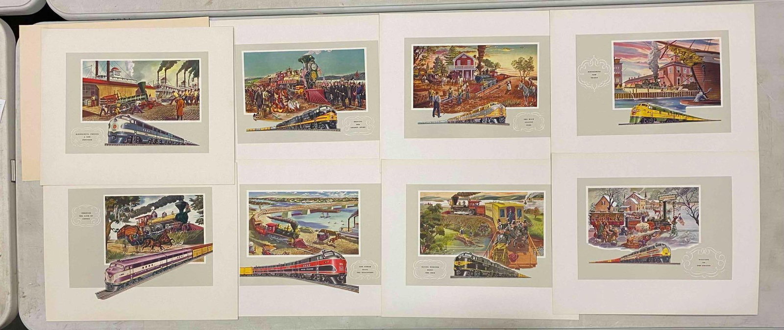 Vintage Currier and Ives Electro-Motive Reprints: Like new in original packaging. One measures L 17 1/2 x W 14 inches.