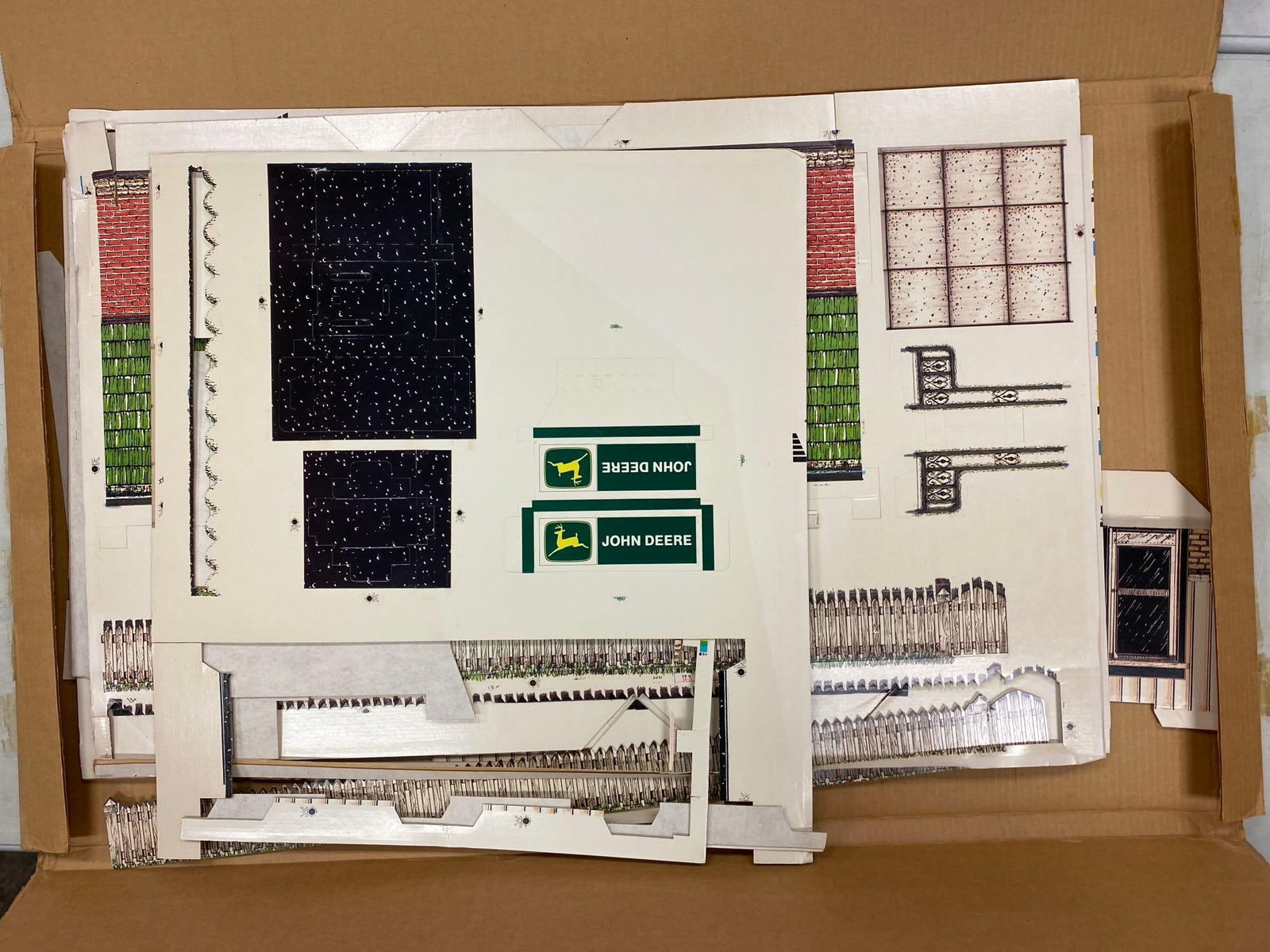 Vintage 1987 John Deere Dealership/Barn Punch-Out Playset: Like new in original packaging. Measure L 42 x W 24 inches.