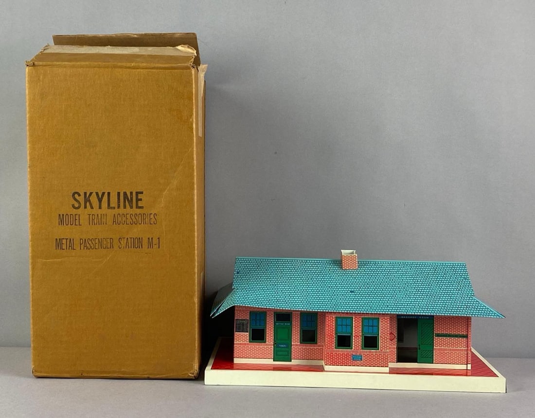 Skyline Model Train Pressed Steel M-1 Passenger Station: In original box, station measures 6 inches H x 14 inches W x 7 inches D