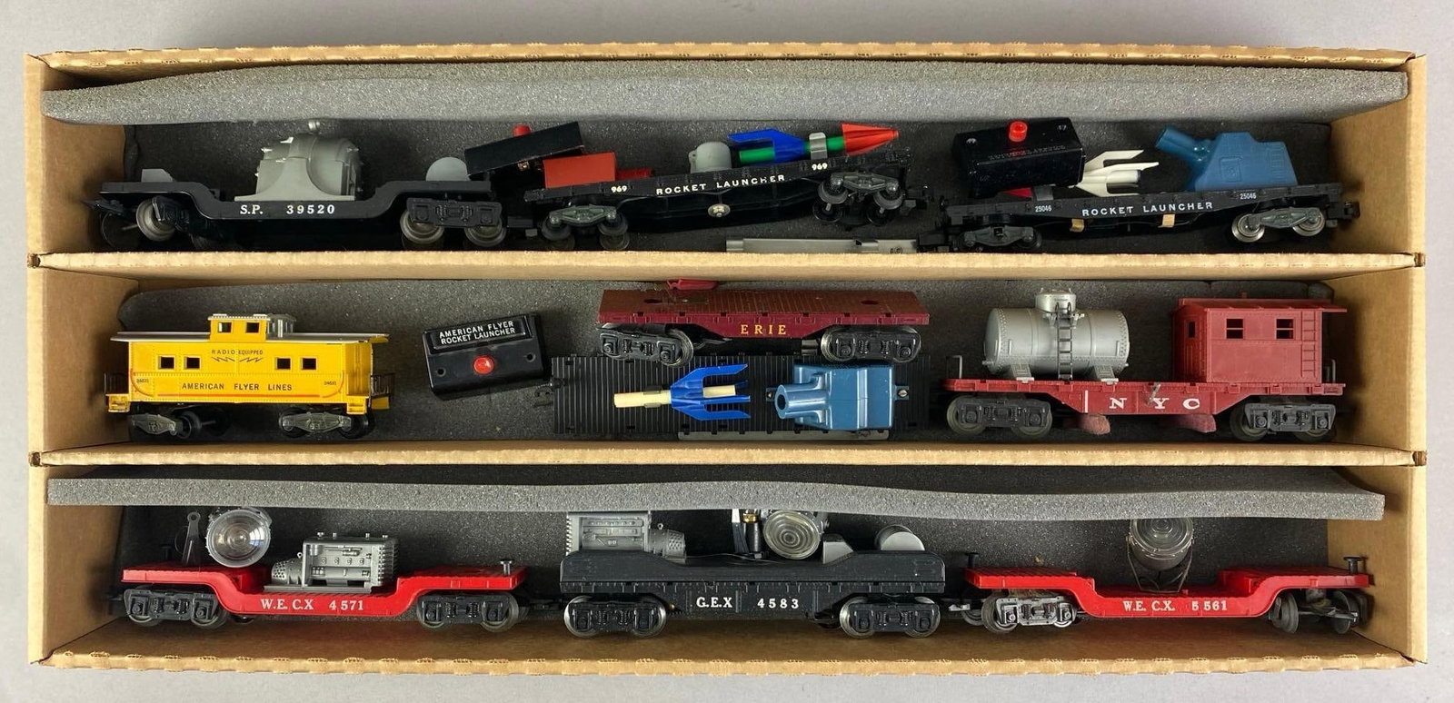 Group of Assorted American Flyer S Scale Train Cars and More: Untested, Includes Rocket launcher, erie flatbed, caboose, controllers and more, longest measures 9 inches L