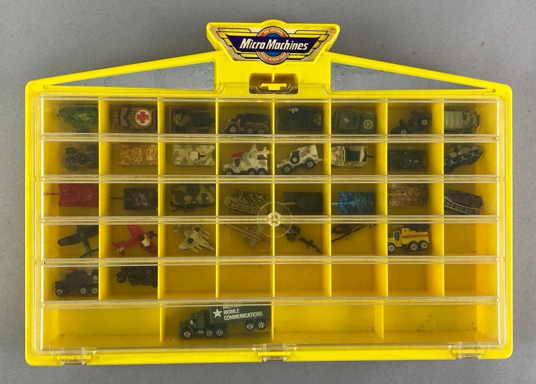 Galoob Micro Machines Military Vehicles In Carrying Case: Includes tanks, jets, motorcycles and more, case measures 9 3/4 inches H x 13 3/4 inches W