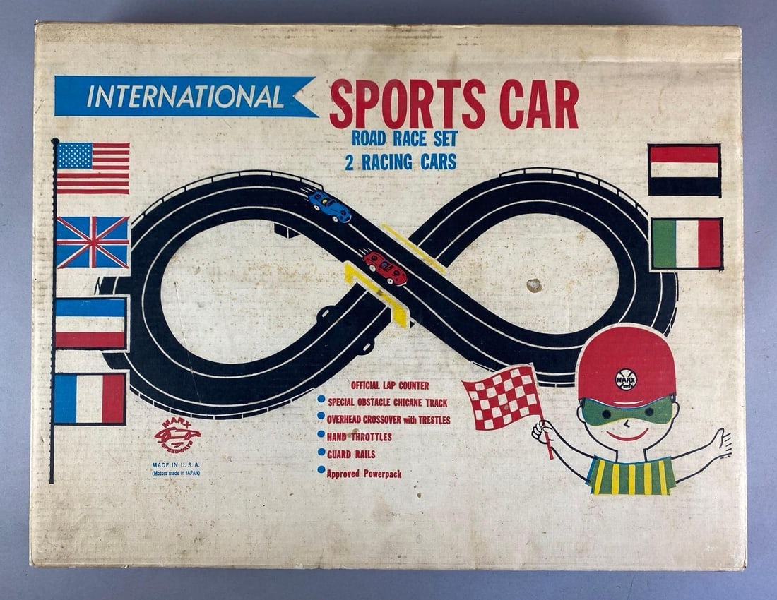 1960s Marx International Sports Car Road Slot Car Race Set: Untested in original box, set seems complete, includes both slot cars, box measures 18 1/2 inches H x 24 inches W x 3 inches D