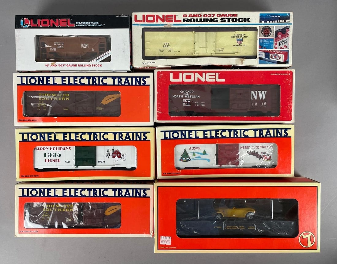 Group of Lionel O Scale Freight Train Cars: Includes 1995 Christmas, flat car with Plymouth prowler