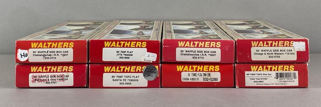Group of 8 Walthers HO Scale Train Cars: in original boxes, includes C and NW Boxcar, TOFC flat Car, B and O Waffle box car and more, each box measures 13 inches W