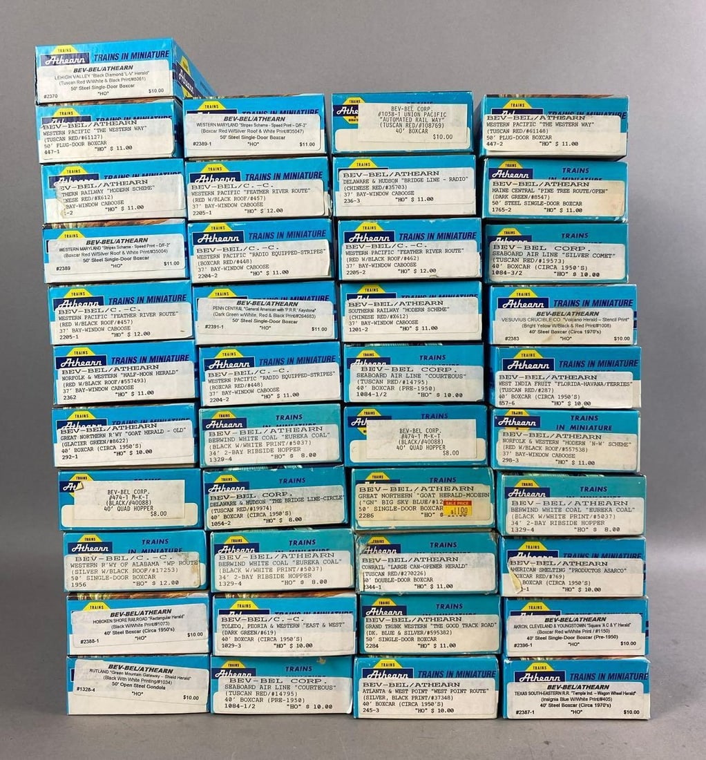 Group of 30+ Athearn HO Scale Train Cars: Includes Boxcars, Hopper, and more. One box measures L 8 x W 4 inches.