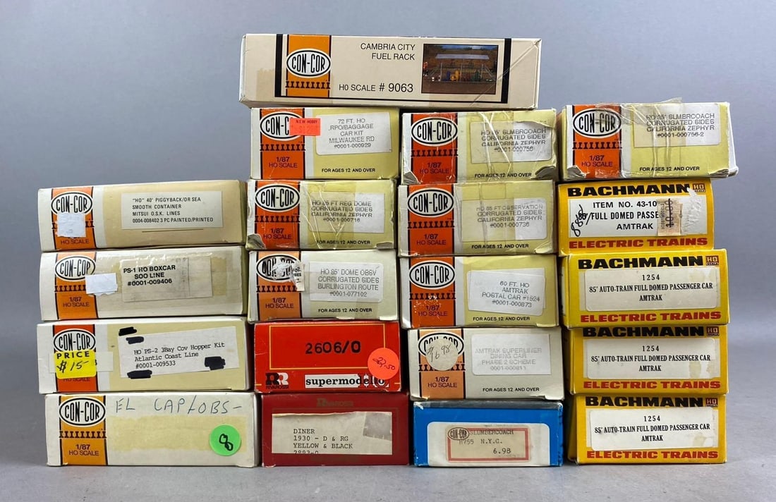 Group of 10+ Con-Cor HO Scale Train Cars and More: Includes Amtrak Passenger Car, Diner, and more. Largest measures L 10 x W 3 inches