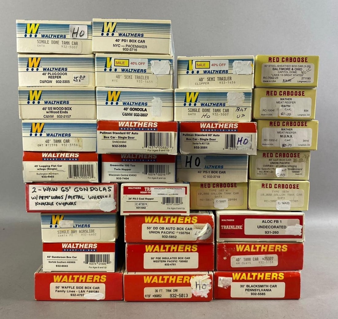 Group of 10+ Walthers HO Scale Train Cars and More: Includes Santa Fe car, log flatbed, and more. Largest measures L 12 x W 4 inches.