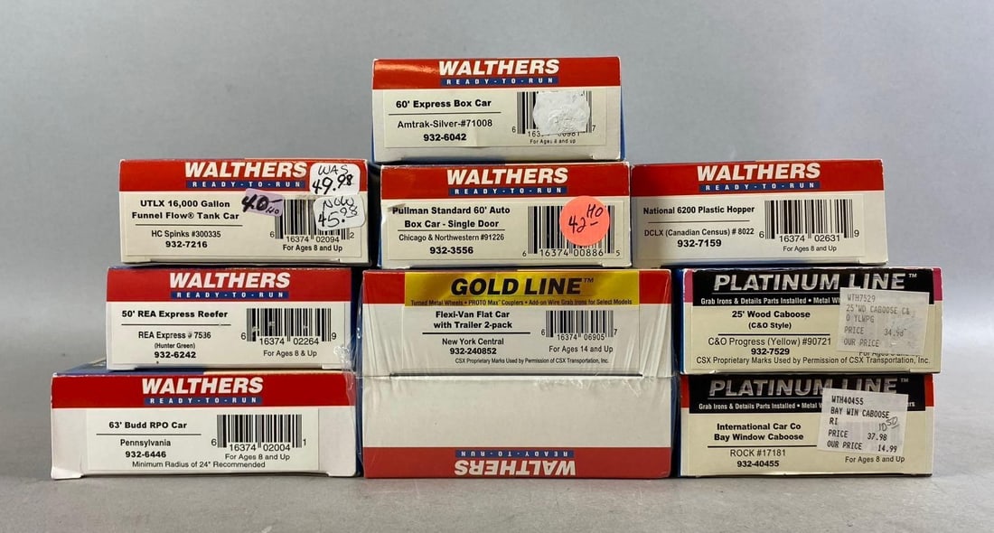 Group of 10 Walthers HO Scale Train Cars and More: Includes Tank, Caboose, and more. Largest measures L 12 x W 4 inches.