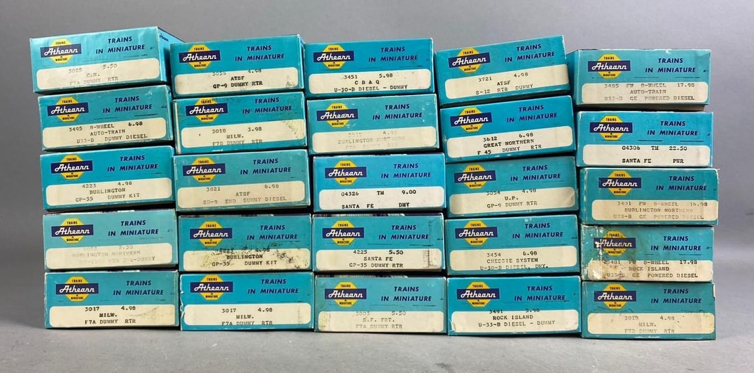Group of 10+ Athearn HO Scale Non-Powered Diesel Locomotives and More: Includes Powered Diesel Santa Fe, Burlington, and more. One measures L 11 x W 4 inches.