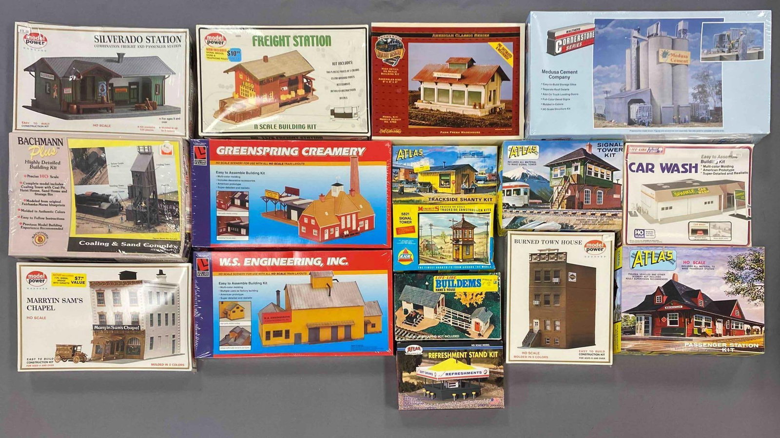 Group of Assorted HO Scale Model Train Building Plastic Model Kits: All sets seem complete, most sealed, includes greenspring creamery, signal tower and more