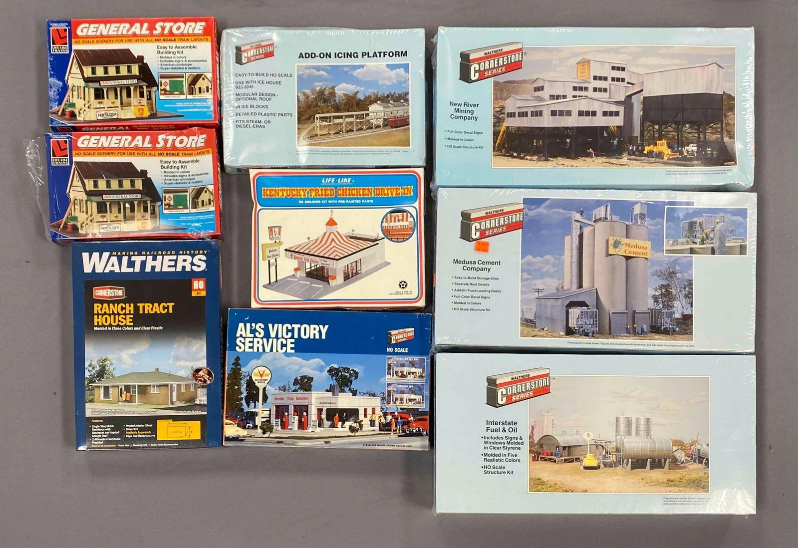 Group of Assorted HO Scale Model Train Building Plastic Model Kits: Most sealed, otherwise sets seem complete, includes interstate fuel and oil, Medusa cement company, kentucky fried chicken drive in and more
