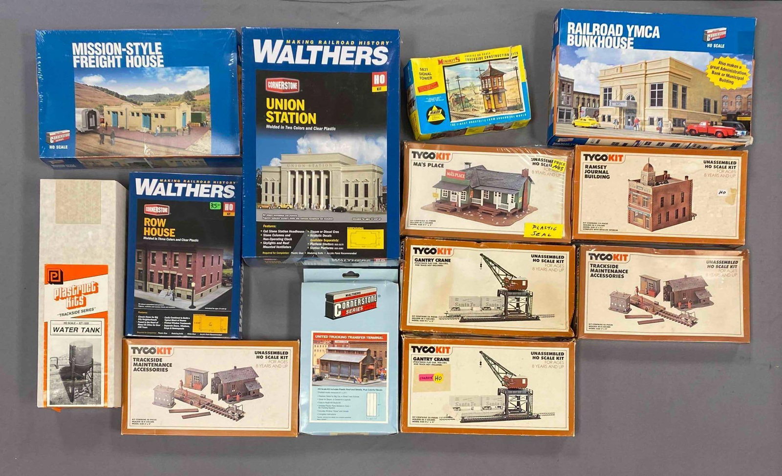Group of Assorted HO Scale Model Train Building Plastic Model Kits: Most sealed, Includes Gantry Crane, trackside maintenance accessories, union station and more,