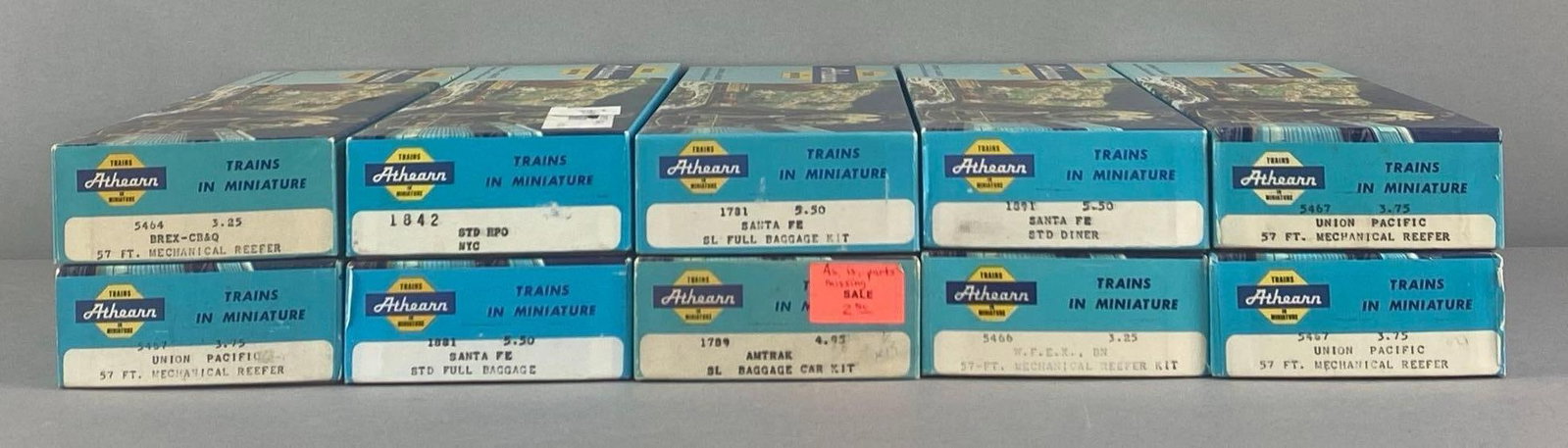 Group of 10 Atheran HO Scale Train Cars: in original boxes, Includes UP Reefer, Santa Fe Baggage, Amtrak Baggage and more, each measures 11 inches W