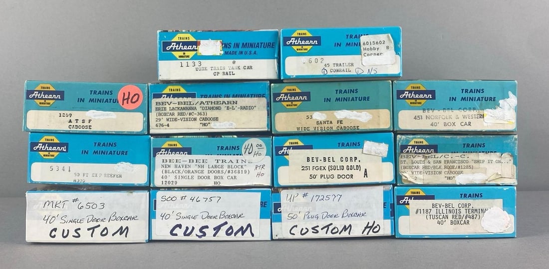 Group of Assorted Athearn HO Scale Train Cars: Includes NH box car, reefer, ATSF caboose and more, each box measures 7 3/4 inches W