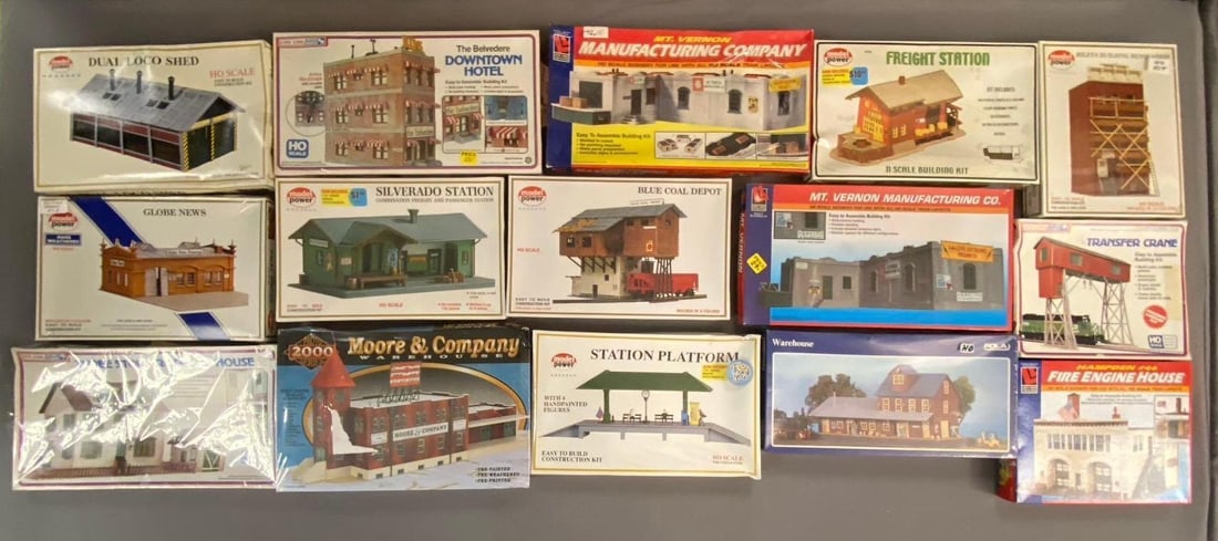Group of 10+ Model Power HO Scale Model Building and More: Includes station, warehouse, and more. Largest measures L 12 x W 8 inches.