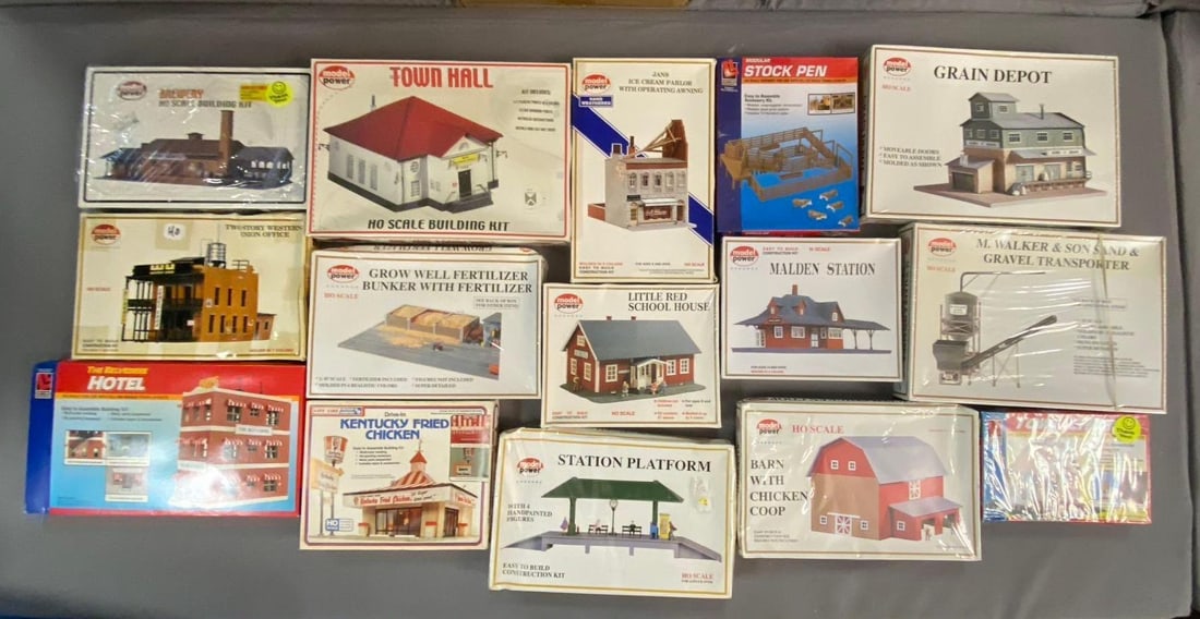 Group of 10+ Model Power HO Scale Model Building and More: Includes bath, town hall, and more. Largest measures L 12 x W 8 inches.