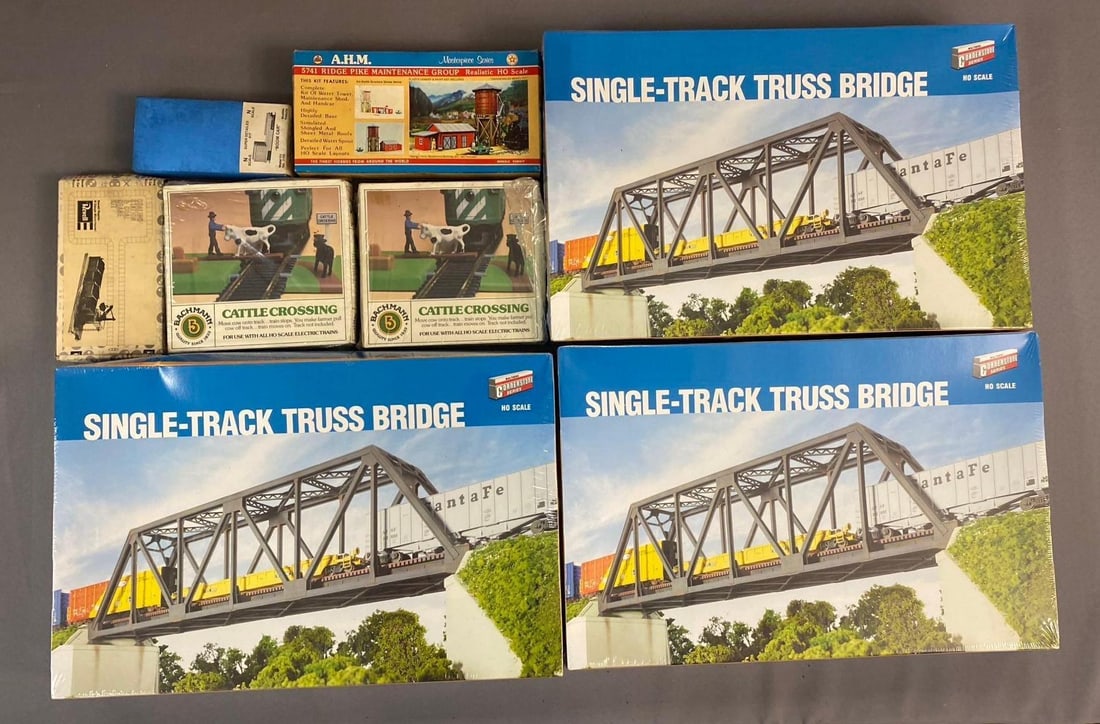 Group of Assorted Walthers Cornerstone HO Scale Buildings and More: Includes Truss Bridge, cattle crossing, and more. Largest measures L 20 x W 13 inches