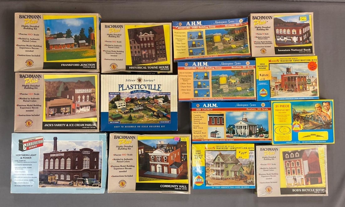 Group of 10+ Bachmann Plus HO Scale Buildings and More: Includes trestle, church, and more. Largest measures L 9 x W 8 inches.