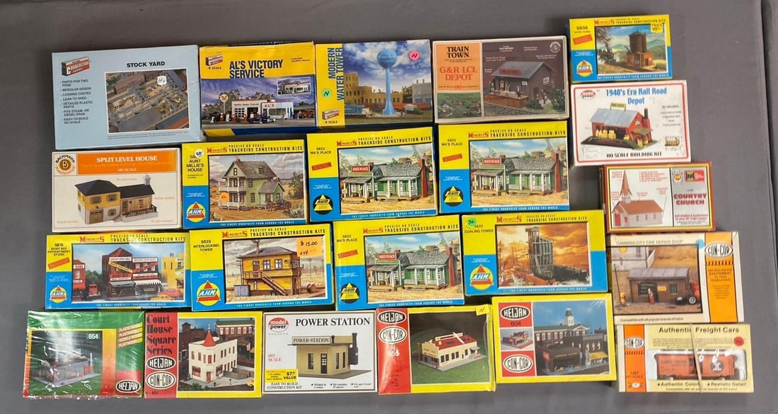 Group of 10+ A.H.M. Minikits HO Scale Buildings and More: Includes power station, road depot, and more. Largest measures L 12 x W 8 inches