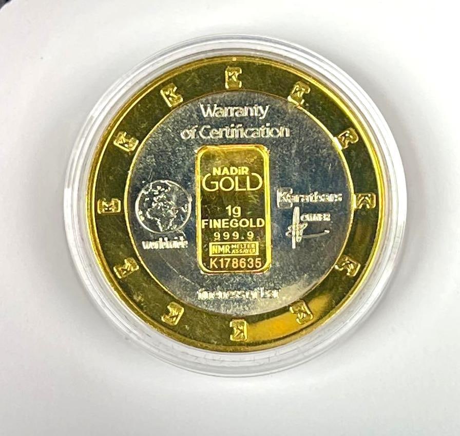 Karatbars Nadir Encased 1 Gram 999.9 Fine Gold Round (1 of 2)