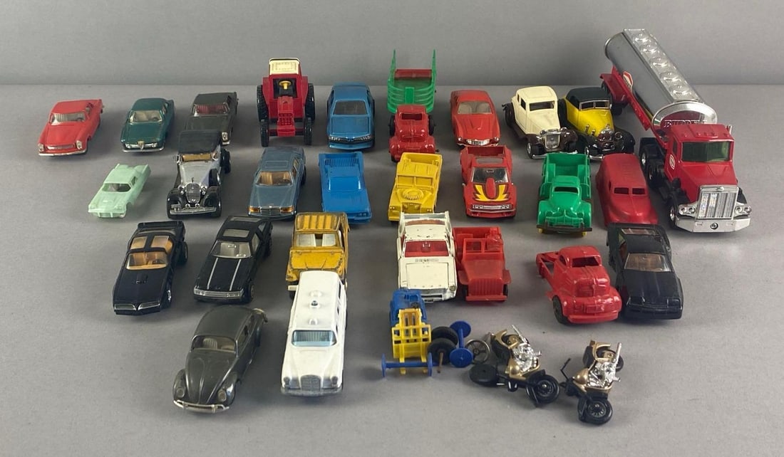 Group of Assorted Toy Vehicles: Features matchbox, Dinky toys and more, includes semis, trucks, cars and more, longest measures 11 1/2 inches L