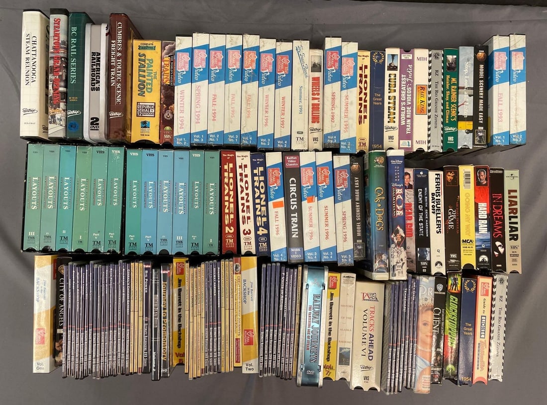 Group of VHS Tapes and DVDs: Includes railroad, Disney, Ferris bueller