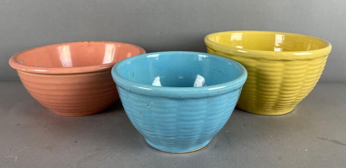 Group of 2 Vintage Watt Pottery Basket Weave Mixing Bowls: Includes orange ribbed bowl, largest measures 4 inches x 7 inches