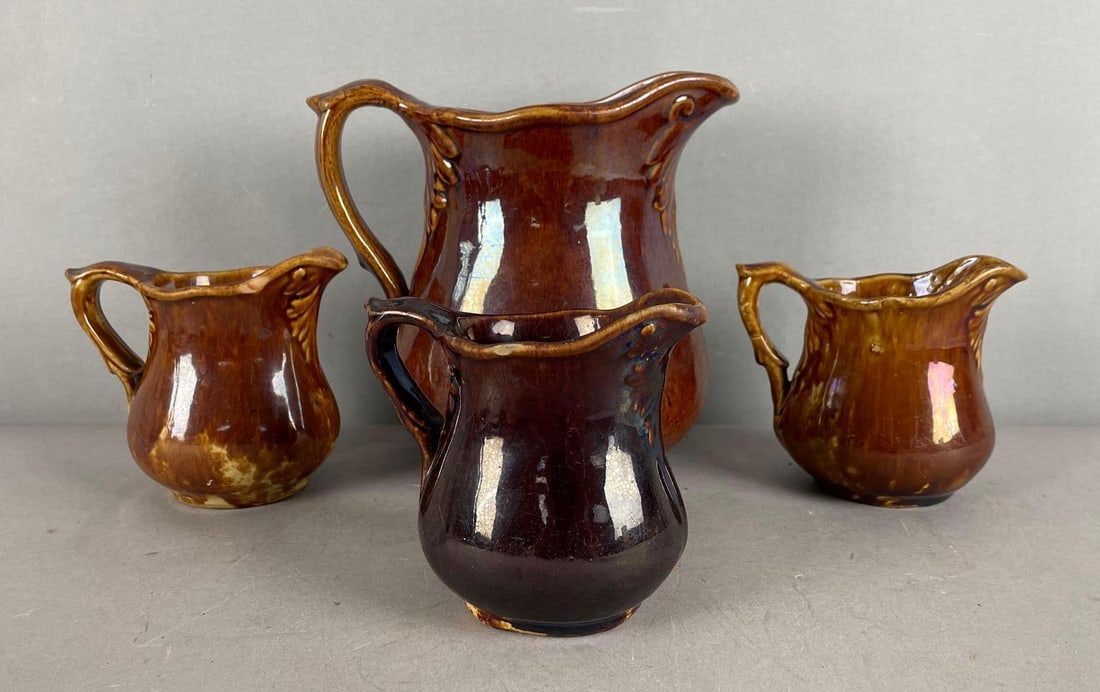 Group of Antique Rockingham Glaze Stoneware Pitchers: Largest measures 7 3/4 inches x 8 1/4 inches x 6 inches