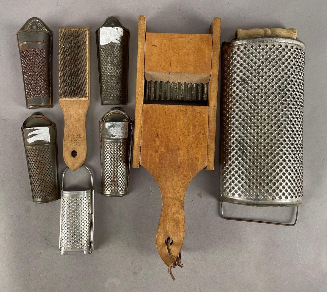 Group of Antique Graters: Cabbage cutter measures 13 3/4 inches x 4 1/2 inches x 1 1/4 inches