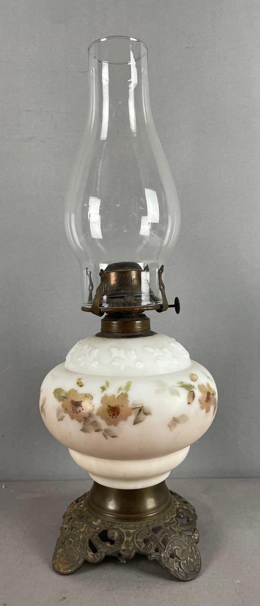 Antique Hand Painted Satin Glass Kerosene Lamp: Brass base, measures 17 inches x 6 inches, 3 inches fitter