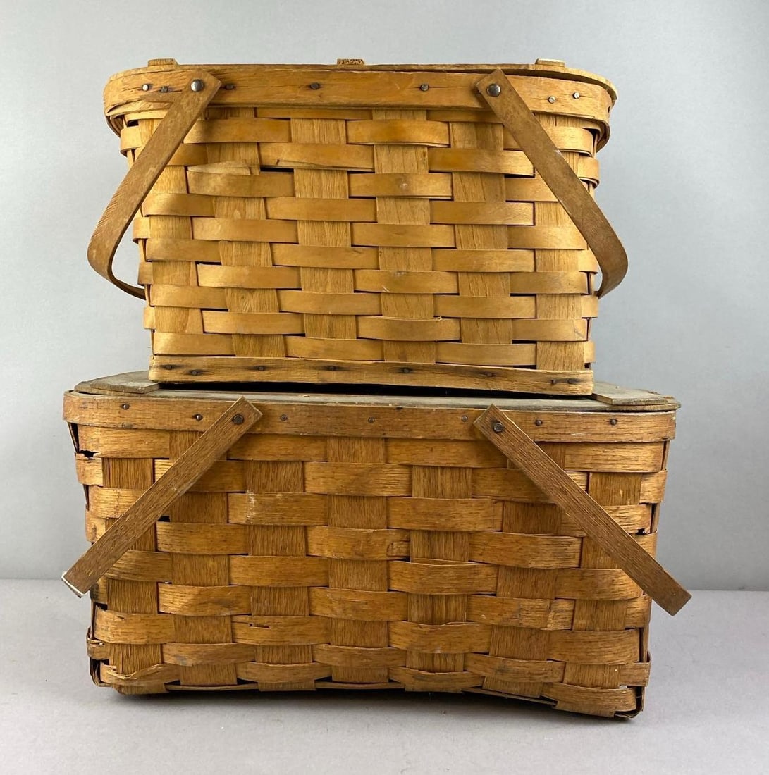 Group of 2 Antique 1930s Wicker Picnic Baskets: Largest measures H 10 x W 10 x L 19 inches