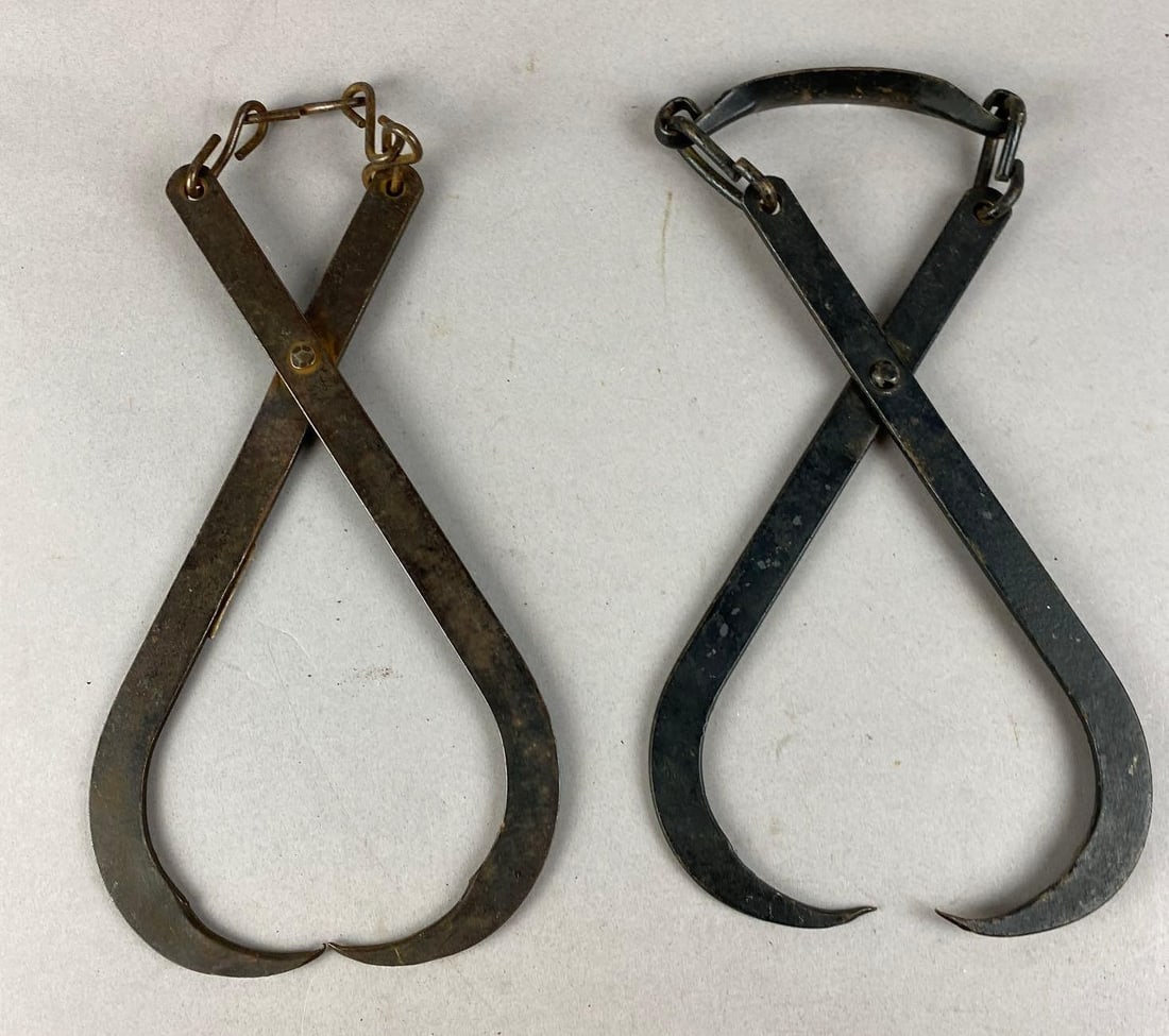 Group of 2 Antique Ice Tongs: One measures 12 inches in length.