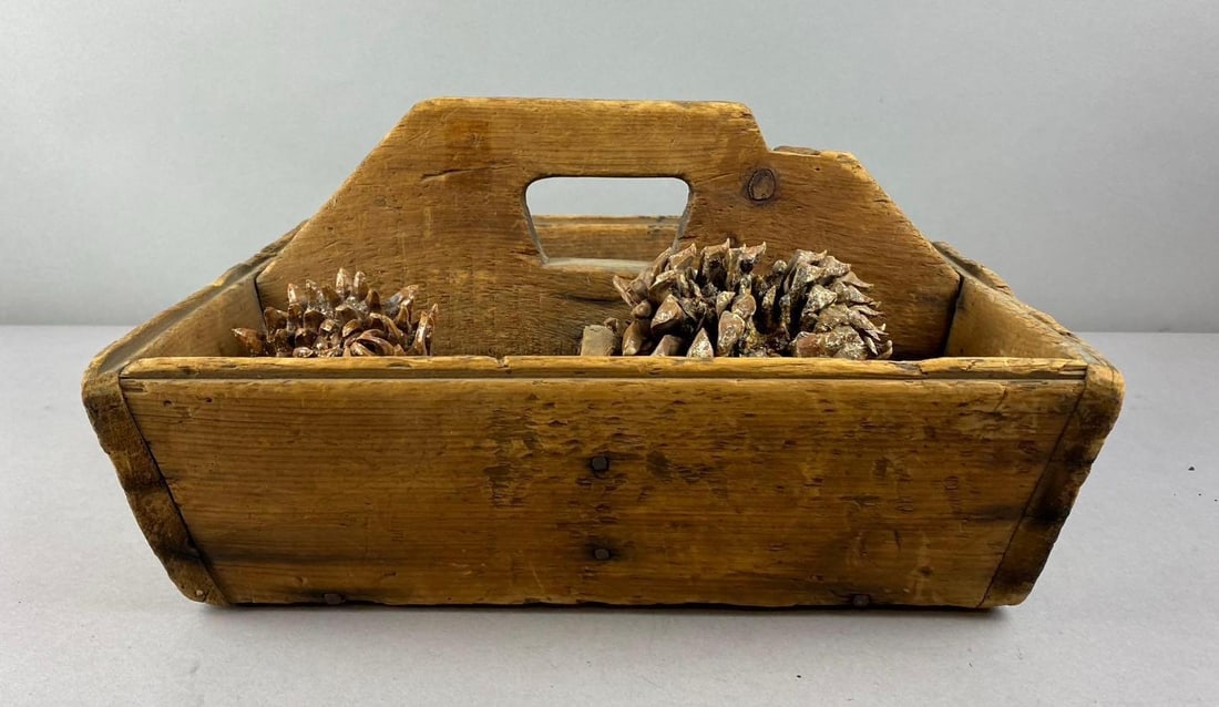 Primitive Wood Tool Caddy: Includes Coulter Pine Cones from California. Measures H 9 x W 14 x L 17 inches.