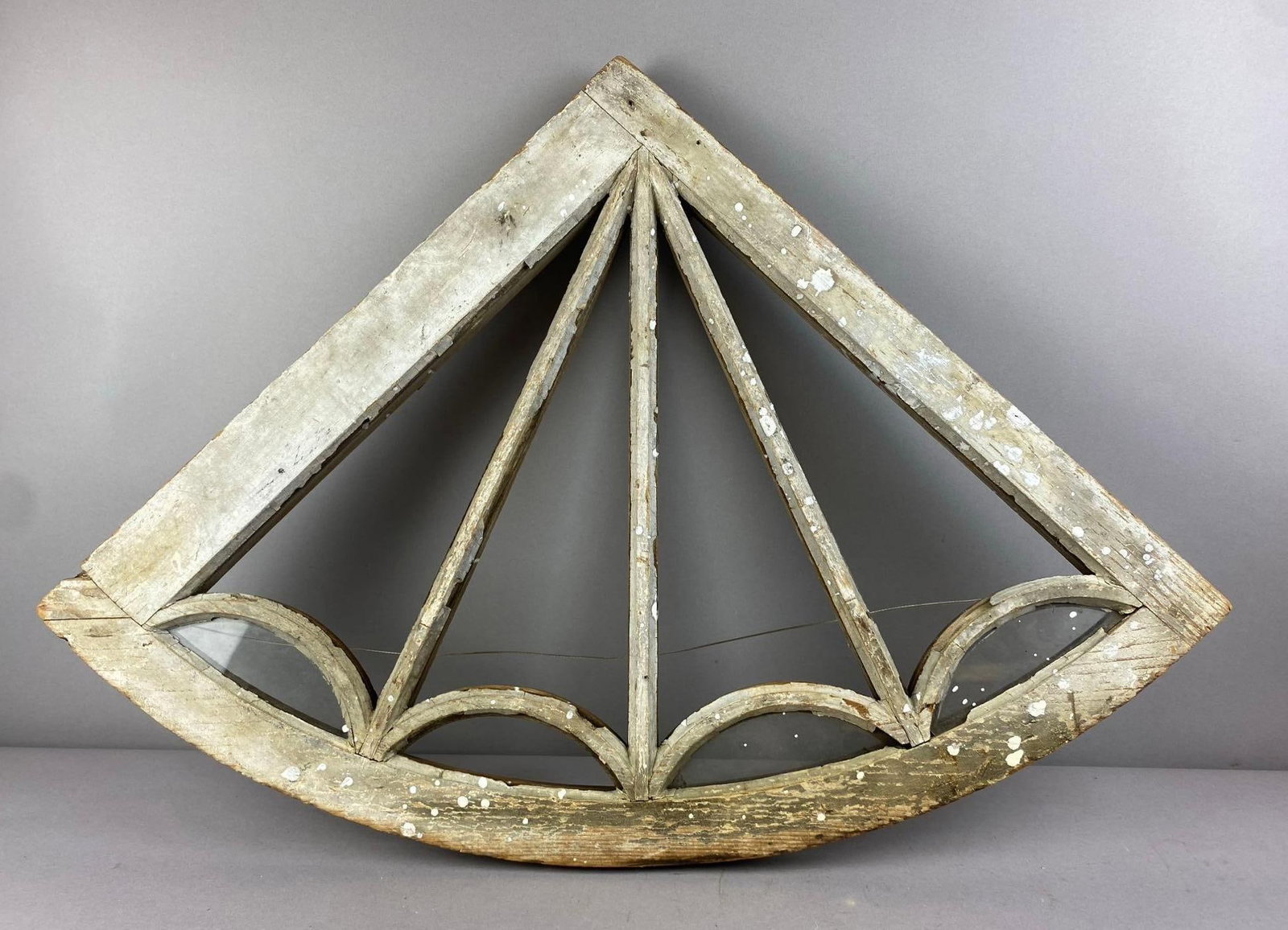 Antique 1900s Wedged Window: Missing panels L 32 x W 24 inches. No in house shipping. Third party recommended.