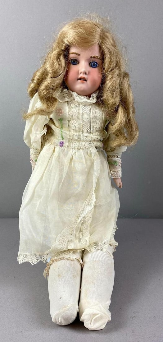 Antique 1900s Armand Marseille Porcelain Bisque Doll: Mold 390. Made in Germany. Has taped up left leg. Measures 20 inches tall.