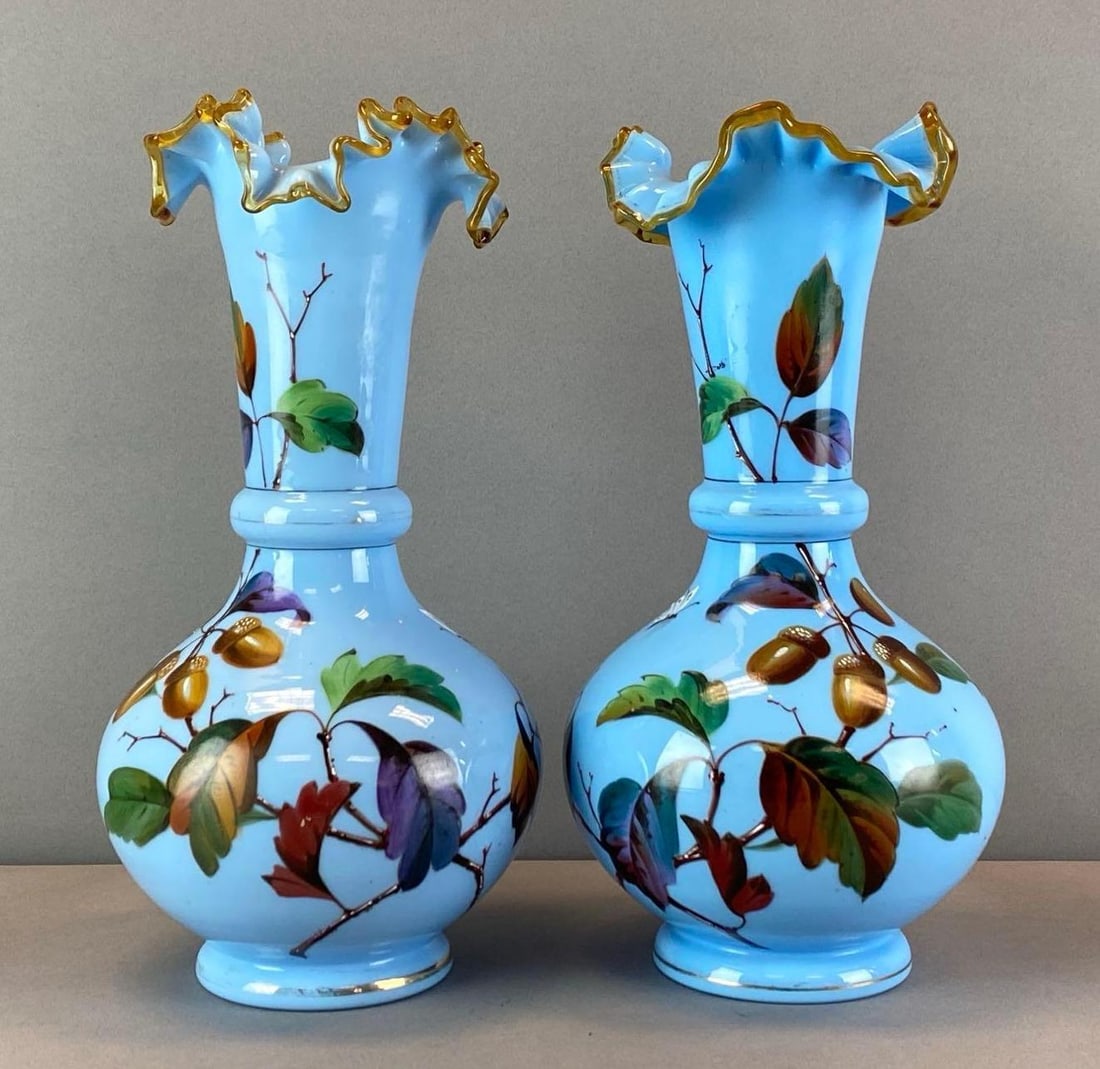Antique Pair of Blue Bristol Glass Floral Motif Vases: Hand painted floral motifs, ruffled ribboned applied rim, Pontil marks shown, each measures 11 inches H x 5 1/2 inches W