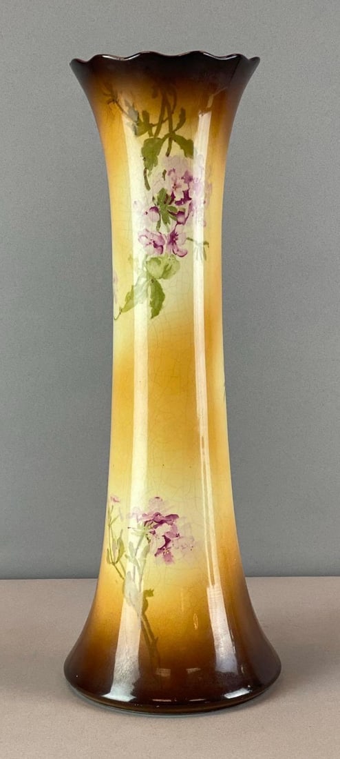 IOGA Warwick Floral Motif Brown Scalloped Edge Porcelain Vase: Marked on base, crazing throughout, measures 15 inches H x 5 1/4 inches W x 5 1/4 inches D