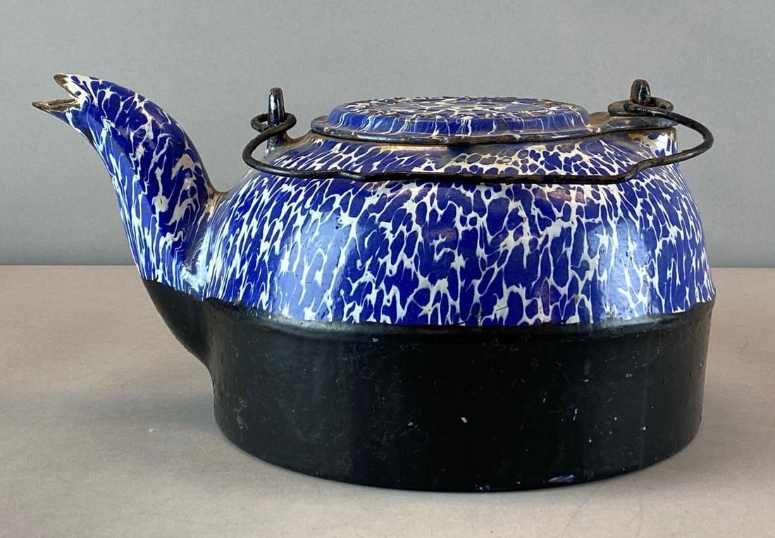 Vintage Wrought Iron Range Co. Cast Iron and Enamel Teapot: some rust, measures 6 1/2 inches H x 12 1/2 inches W x 9 1/2 inches D
