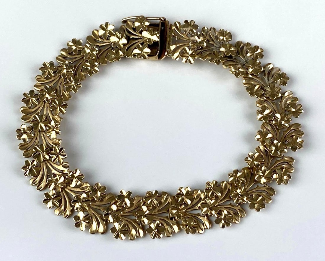 Signed 14K Yellow Gold Floral Link Bracelet: Total weight of 14.9 grams, measures 7 inches L