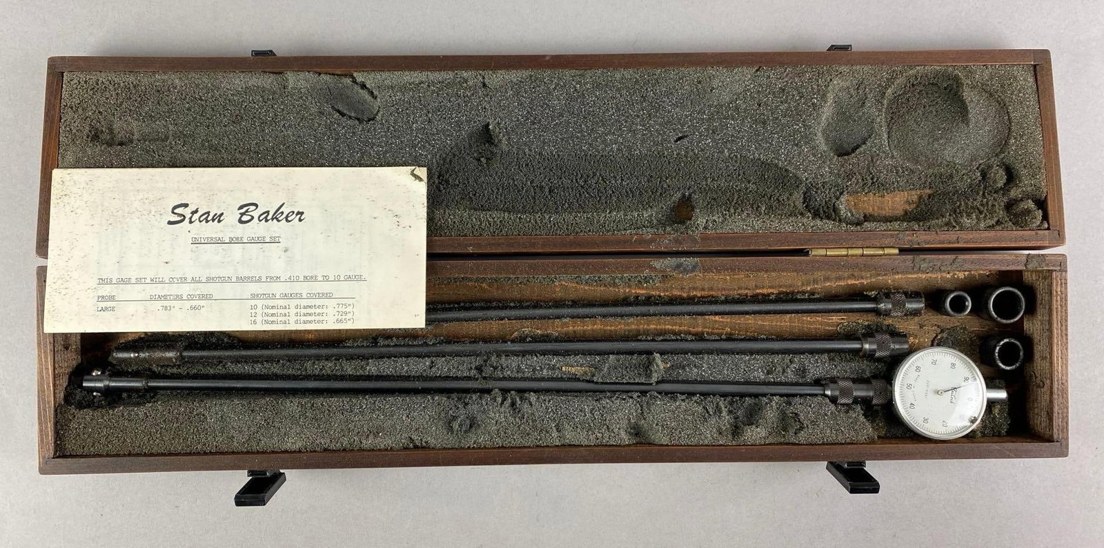 Stan Baker Universal Bore Gauge Set with Wood Case: Unknown completion, needs cleaning, case measures 2 1/2 inches H x 23 1/2 inches W x 5 inches D