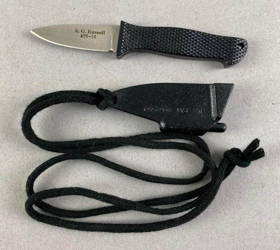 AG Russell Scalpel Fixed Blade Neck Knife: ATS-34 steel, made in Japan, Measures 4 1/4 inches L with a 1 1/2 inches blade