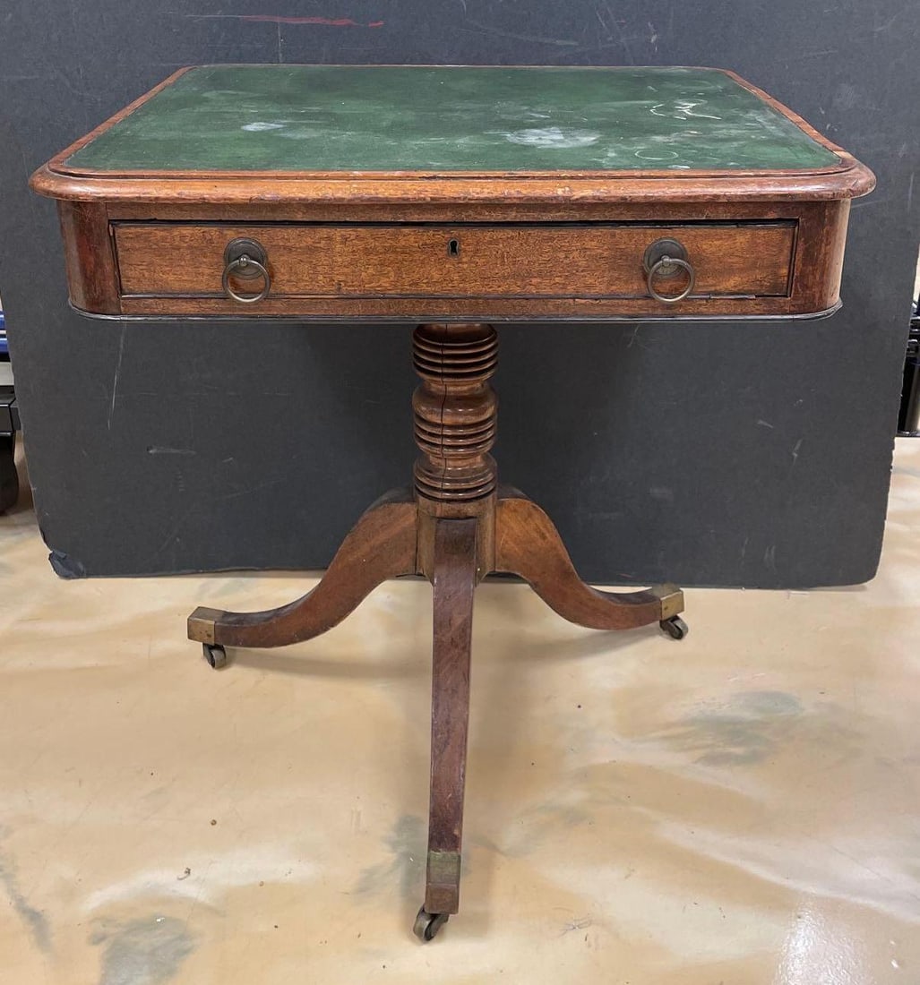 Antique Mahogany Occasional Table with Green Leather Top: No in-house shipping available, 3rd party shipper or pickup only. Pedestal legs, false drawer front on reverse missing a knob, measures 29 inches x 27 inches x 24 inches
