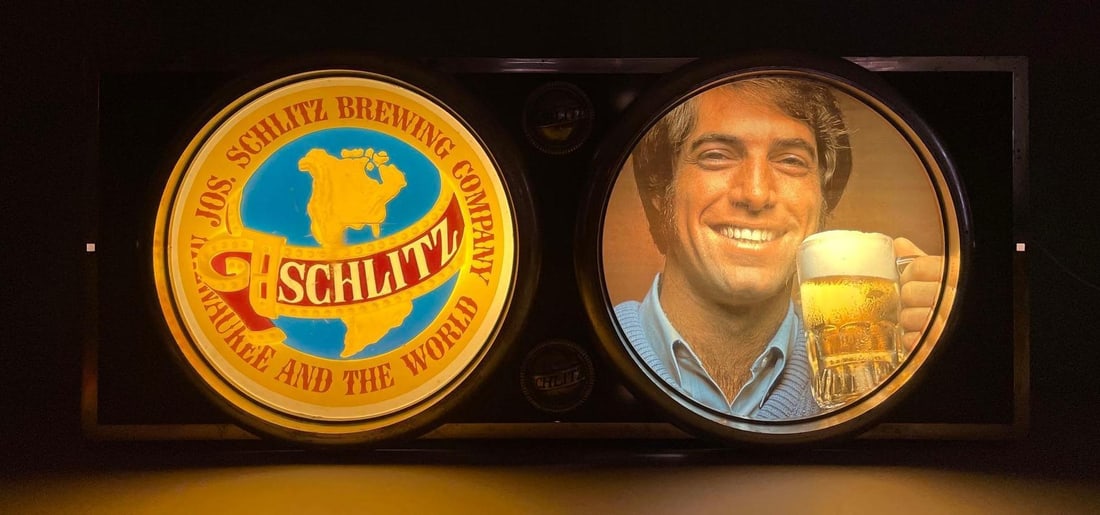 1972 Schlitz Beer Light-Up Advertising Sign: Working condition, measures 15 1/4 inches x 36 inches x 7 inches