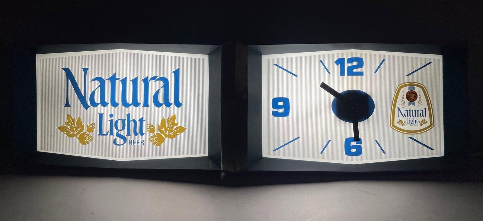 Vintage Natural Light Beer Light-Up Advertising Clock: Working condition, some cracks, 10 inches x 35 1/2 inches x 6 inches