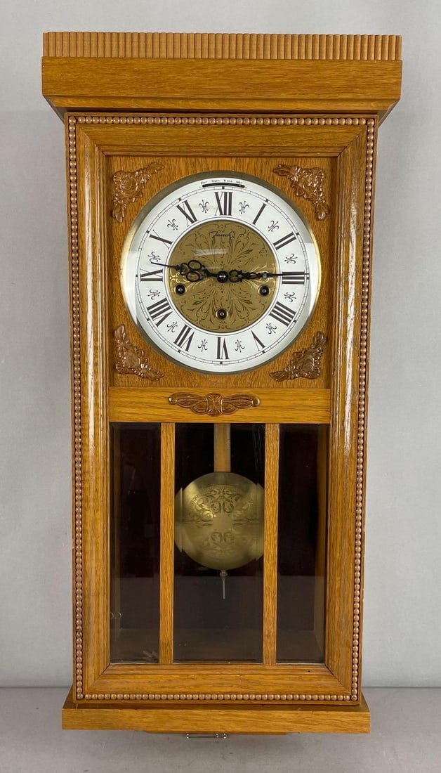 Vintage Jauch West German Oak Wind-Up Wall Clock: Working condition with key, chime, measures 28 1/2 inches x 11 3/4 inches x 80