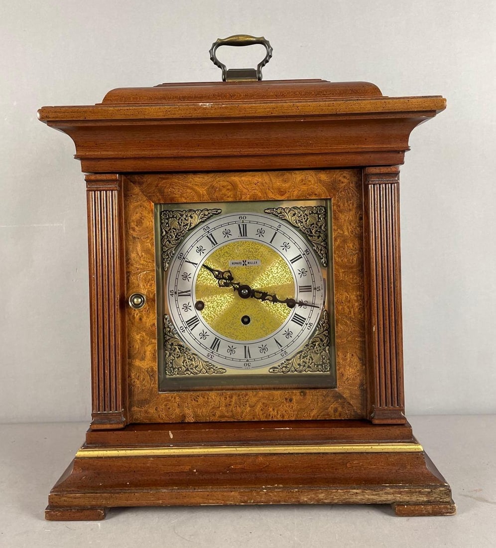 1980 Howard Miller Wood Wind-Up Mantle Clock: Model 612436, working condition with key, measures 18 1/4 inches x 14 1/4 inches x 8 inches